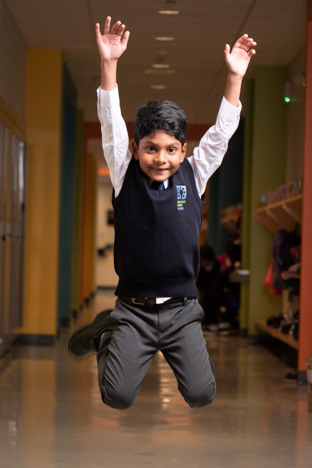 Newtons Grove School primary student cheering